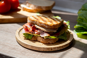 Grilled club sandwich with bacon, ham and turkey, a Food & Drink Photo by etorres69