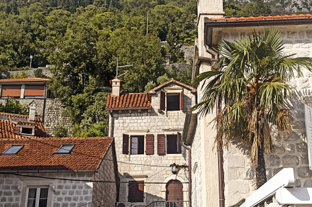 Beautiful stone buildings with mount, an Architecture Photo by Photo by YuraYaryna