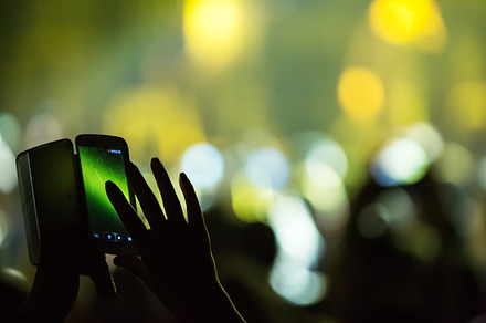 Crowd at concert and blurred stage lights  stock photo containing crowd and