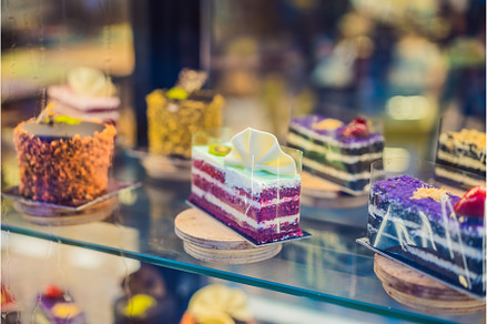 Different types of cakes in pastry, a Food & Drink Photo by Elizaveta Galitskaya
