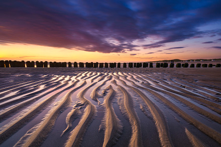 Lines of sand on the seashore, a Nature Photo by Landscape and travel