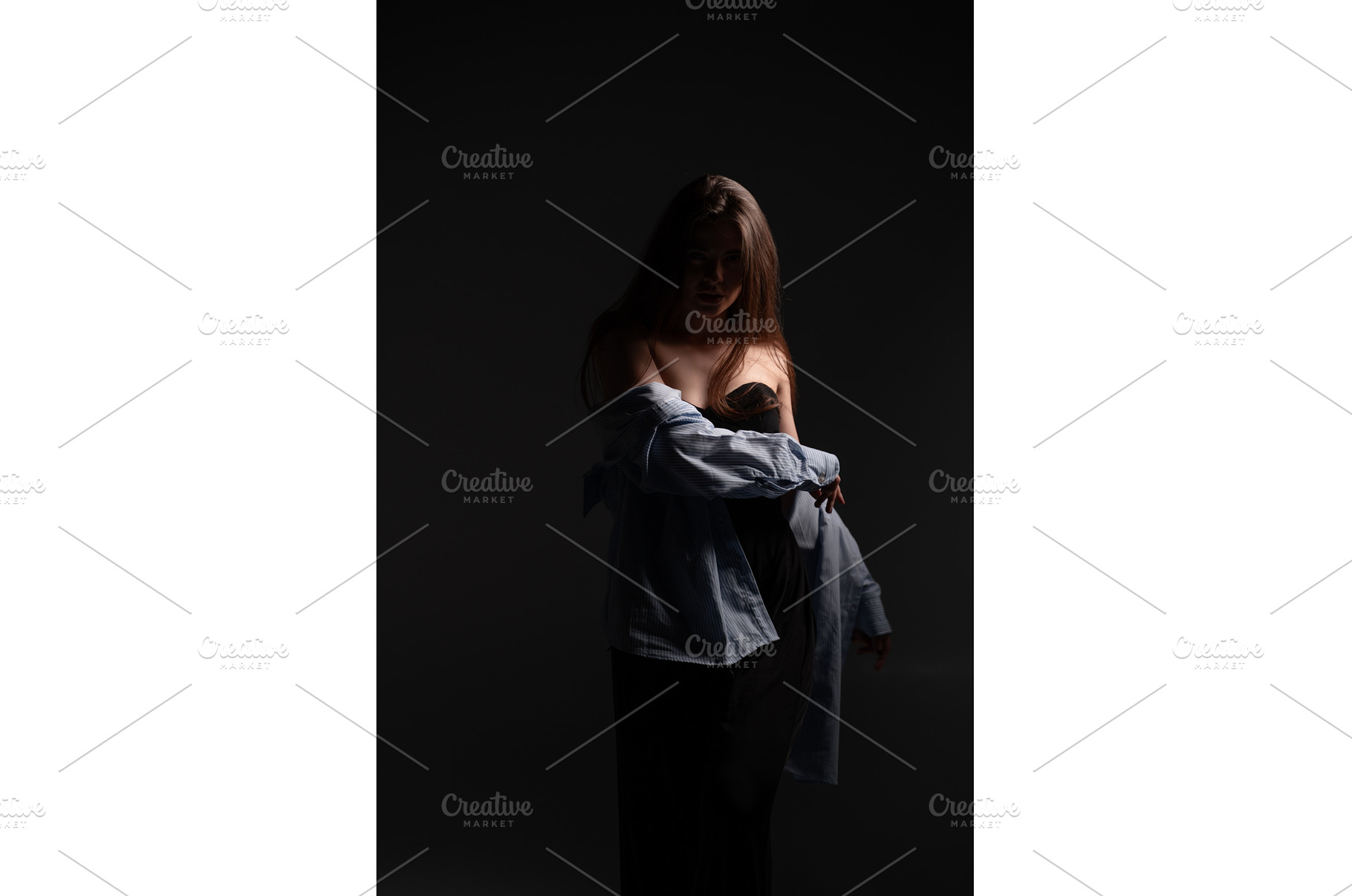 Young woman posing sensually in a, a Person Photo by volodymyrshtun13795