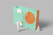 4 Paper Shopping Bag Mockups, a Packaging Mockup by megostudi0 (Thumbnail 2 of 6)
