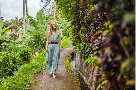 Young woman tourist in Bali walks, a Nature Photo by Elizaveta Galitskaya