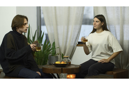 Students communicate and drink tea, a Person Photo by Media Whale Stock