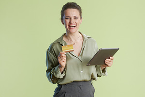 Effortless online shopping on a tablet, a Business Photo by Alliance Images