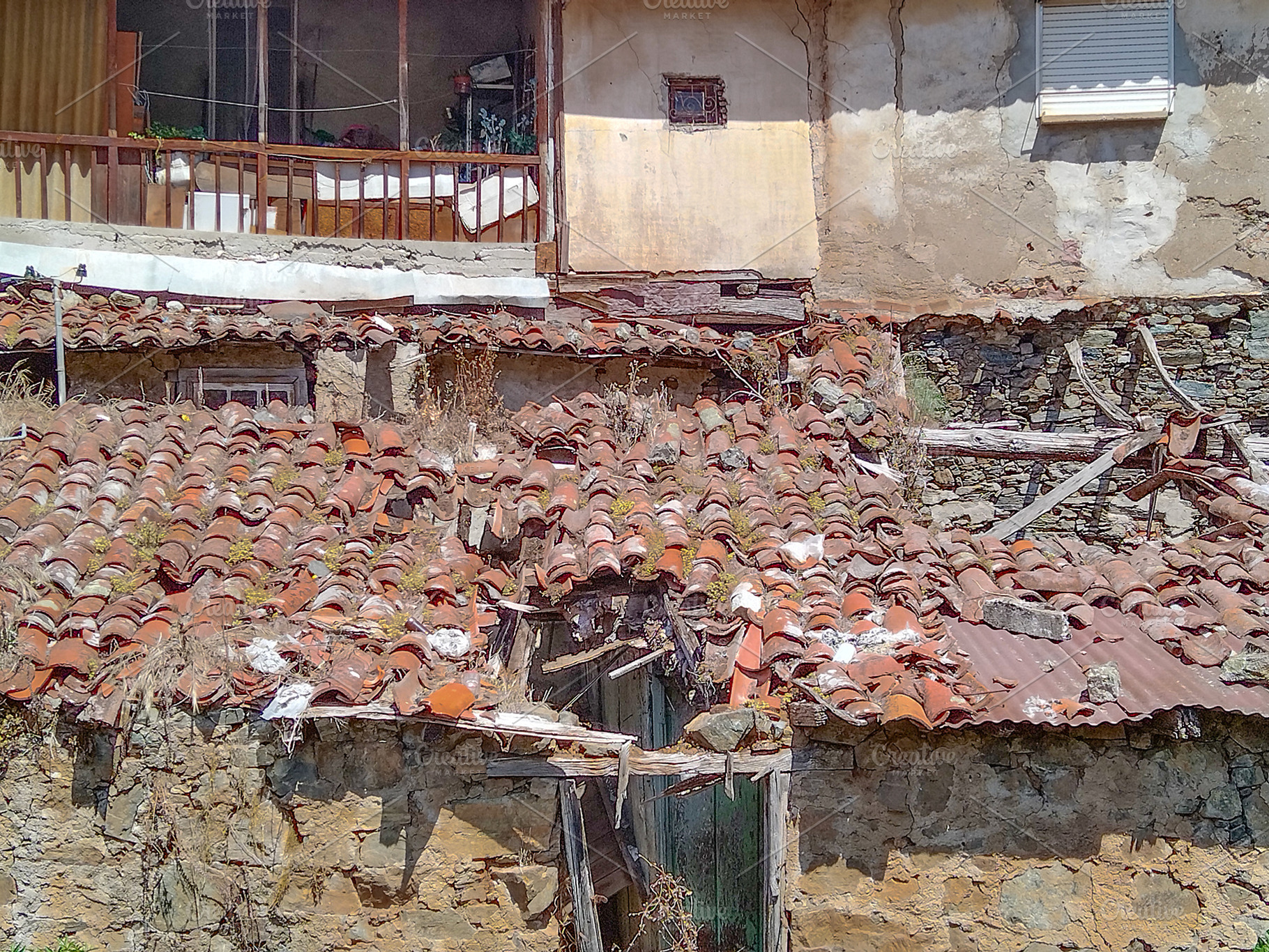 Collapsed roof of abandoned residential building, an Architecture Photo by DanFLCreativo