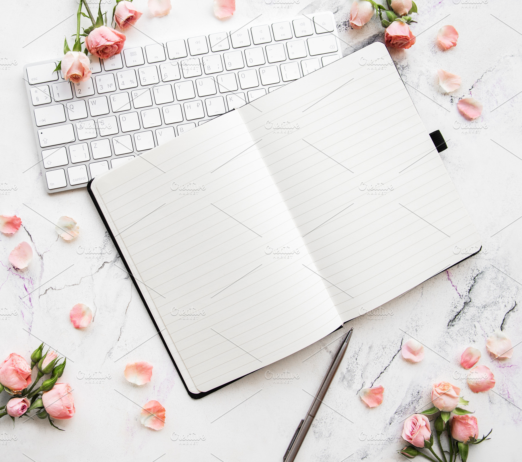 Blogger or freelancer workspace containing notebook, flat, and top, a Holiday Photo by Olena Rudo