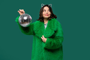 Playful woman in green fur coat look, a Person Photo by Elena Vagengeim