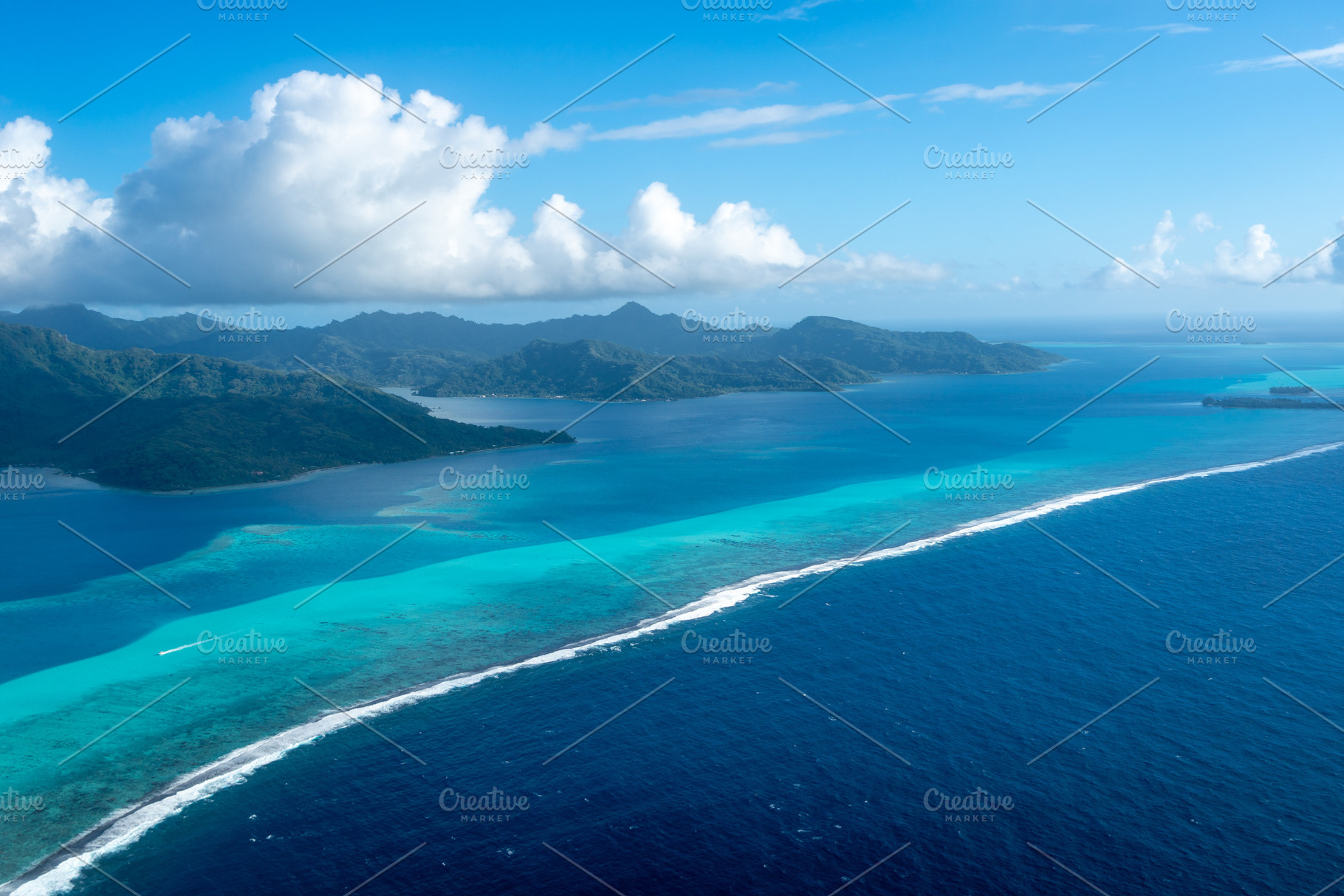 Aerial view of Tahaa island, French Polynesia, with turquoise la, a Photo by GoodGoods