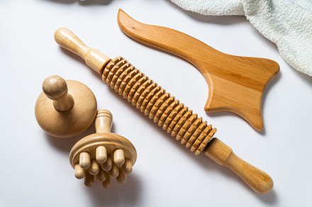 Anti-Cellulite Maderotherapy Instruments on White Table