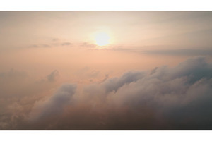 Sun shining through clouds during, a Nature Photo by Goinyk