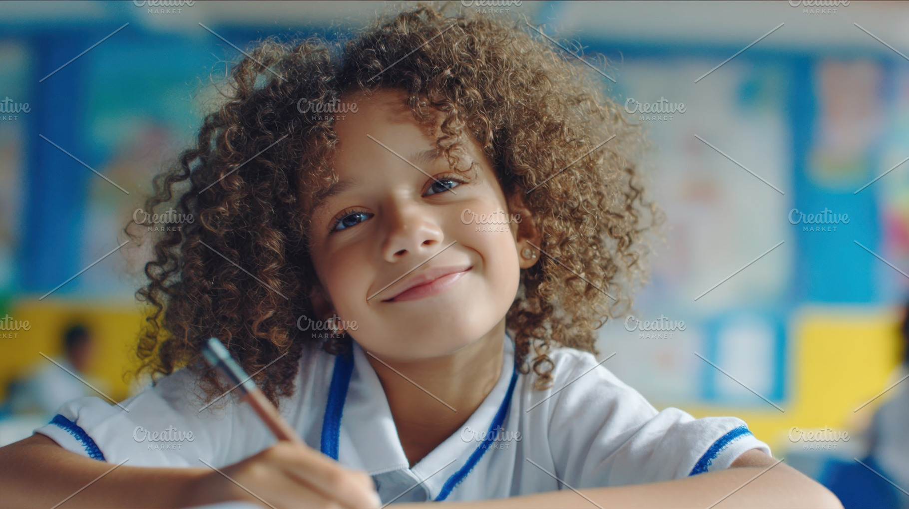 Happy girl writing in classroom, a Photo by Beautiful things