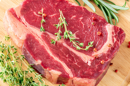 Raw beef steak, a Food & Drink Photo by Alexander Prokopenko