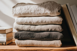 Monochrome Stack of Linen Towels, a Beauty & Fashion Photo by Virgo Studio