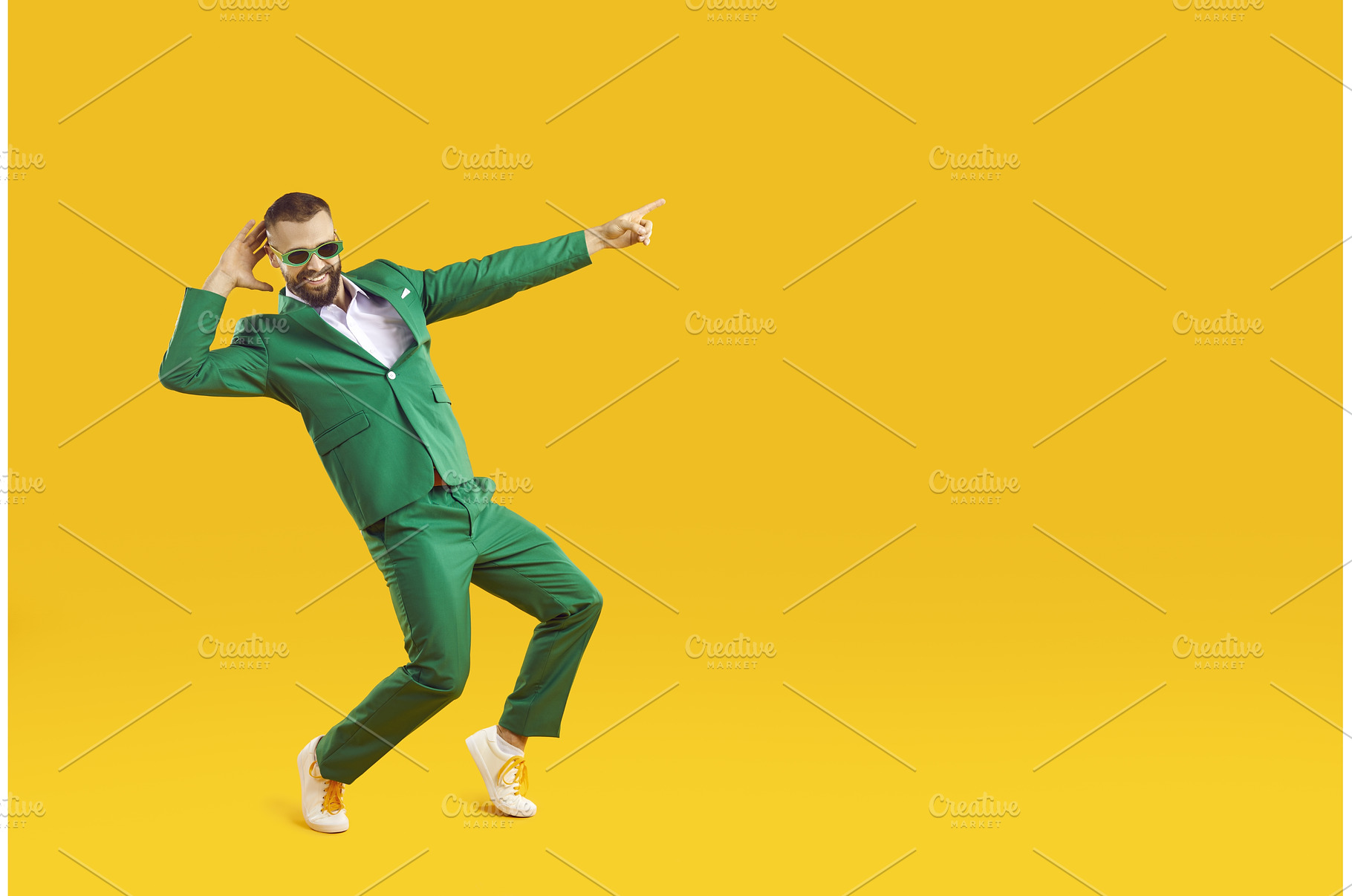 Happy funny man in green suit, a Person Photo by StudioRomantic