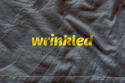 Wrinkled Logo Mockup Collection, an Apparel Mockup by Fields (Thumbnail 4 of 19)