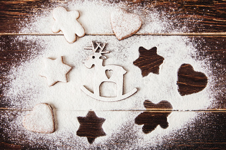 Gingerbread with flour on the wood., a Holiday Photo by Kolomiyets Viktoriya