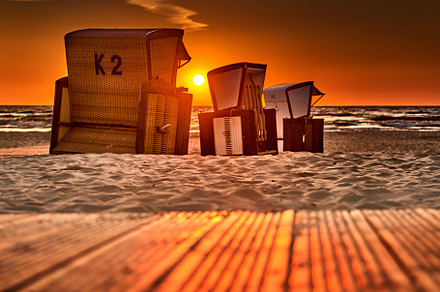 beach chairs on the island of usedom in the sunrise