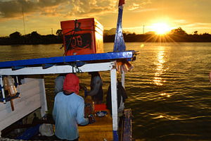 Fishermen Sorting Fish, a Photo by bastera