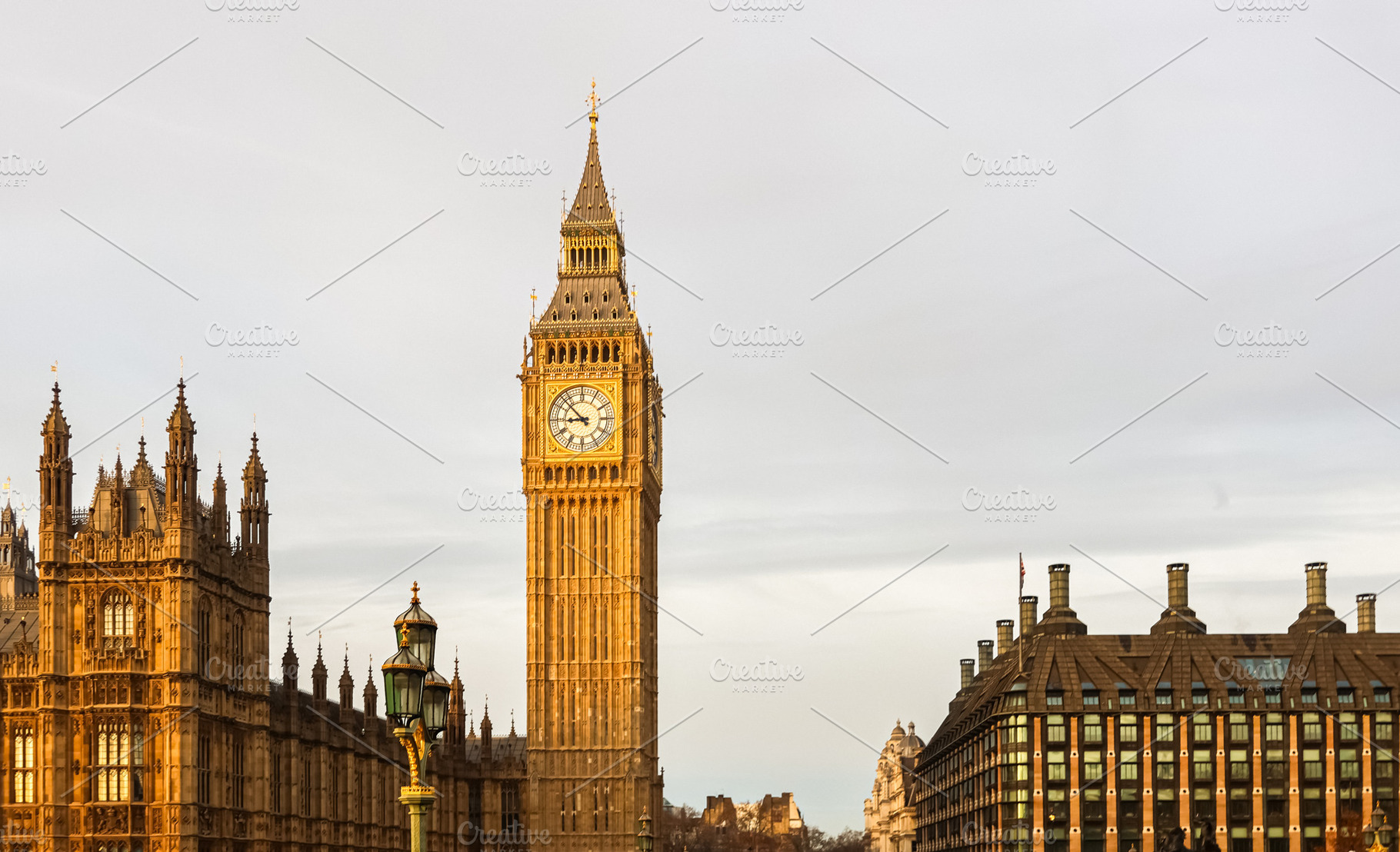 Elizabeth Tower standing tall with Houses of Parliament, iconic London landmark, a Photo by Studio ANNA