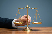 Human Hand holding Balance Scale, a Business Photo by nandinigraphics (Thumbnail 2 of 2)