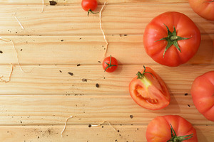 Sparse Tomato Arrangement on a Light Wooden Table, a Food & Drink Photo by Davizro's Market