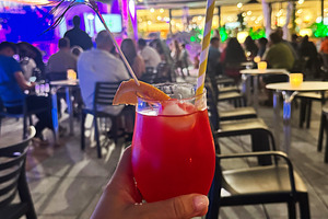 Vibrant cocktail evening at an outdoor restaurant in Cancun, Mexico with music, a Photo by AS photostudio