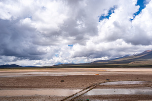 Vast valley and mountains landscape with dramatic sky, Peru, a Photo by GoodGoods