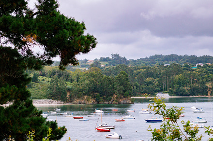 Panoramic view with sailor boats near a small village, a Nature Photo by José Manuel Gelpi