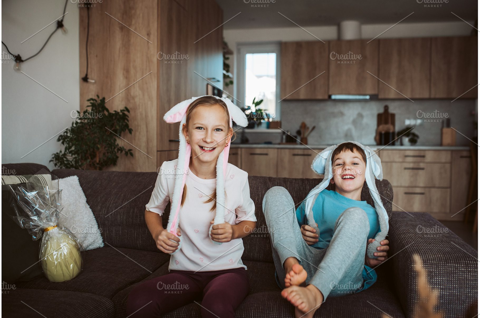 Brother and sister wearing bunny, a Holiday Photo by HalfPoint