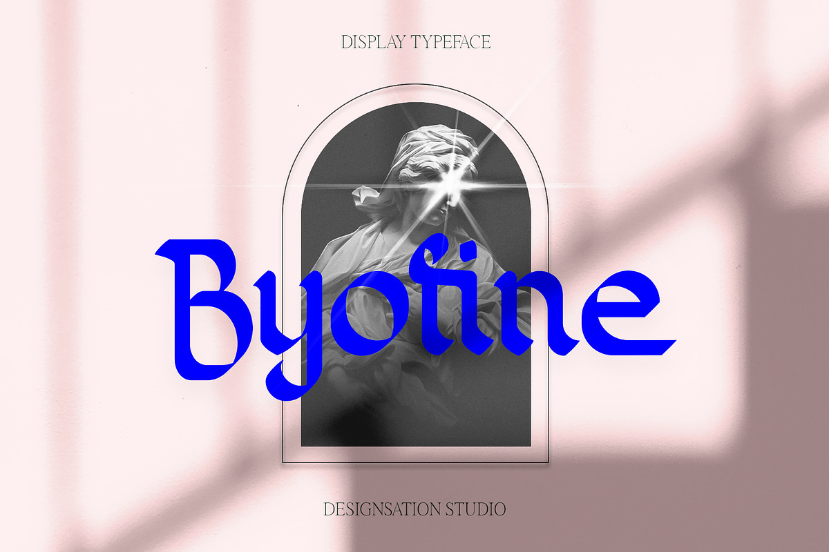 Byofine Gothic Display Typeface, a Blackletter Font by Designsation (Photo 1 of 10)