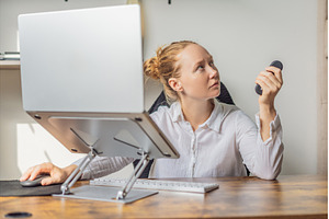 Woman working in her home office, a Business Photo by Elizaveta Galitskaya