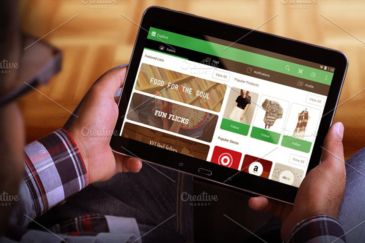Tablet in Hand Mock Up, an iPad Mockup by Qaleb Studio (Photo 1 of 11)