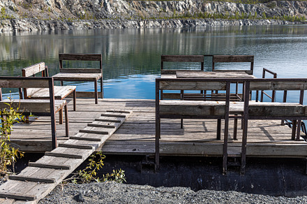 Pontoon with a wooden table and benc, an Architecture Photo by Illustrations&photos