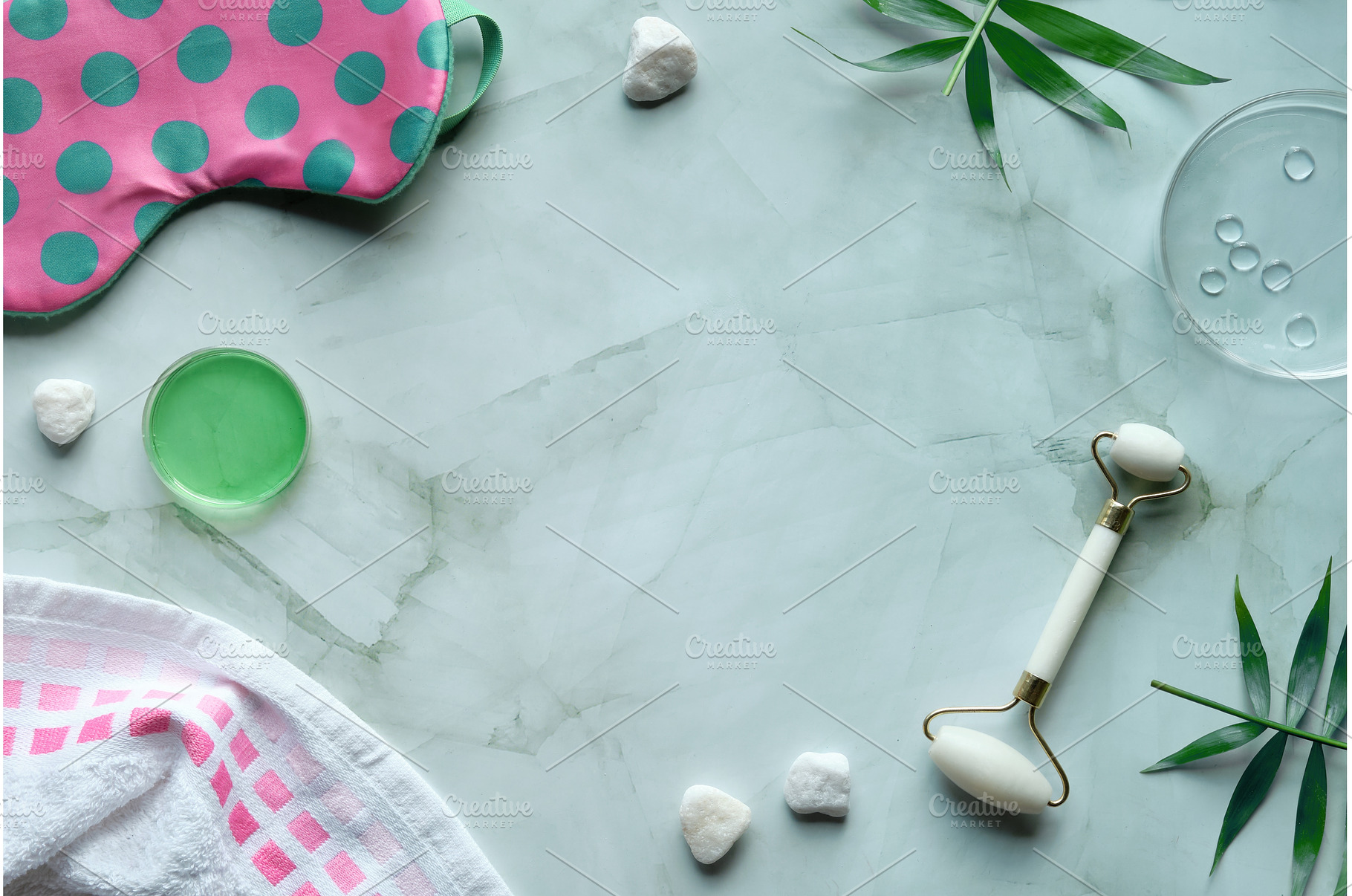 White stone facial roller, towel, an Abstract Photo by tilialucida
