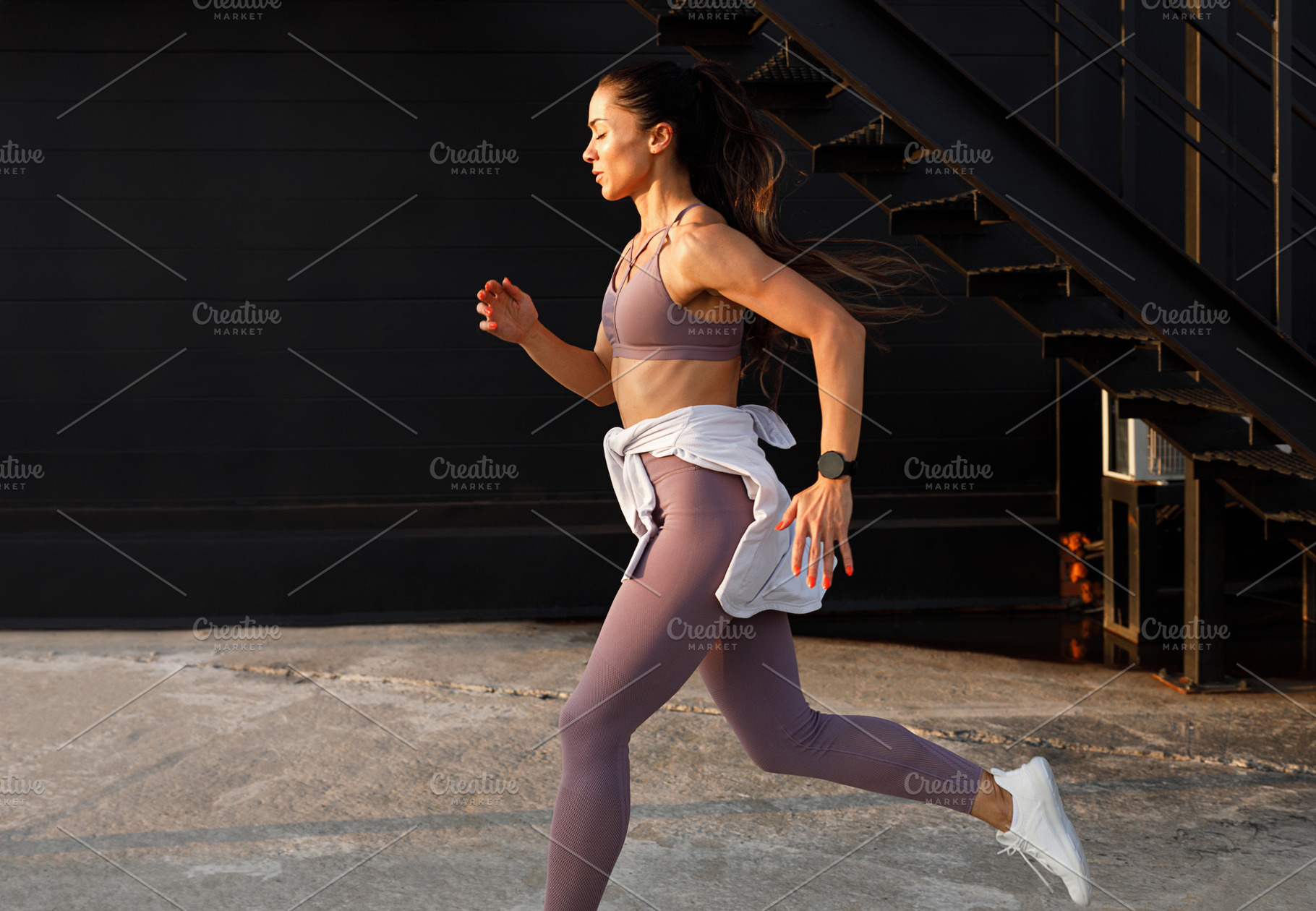 Side view of young female running, a Person Photo by Artem Varnitsin