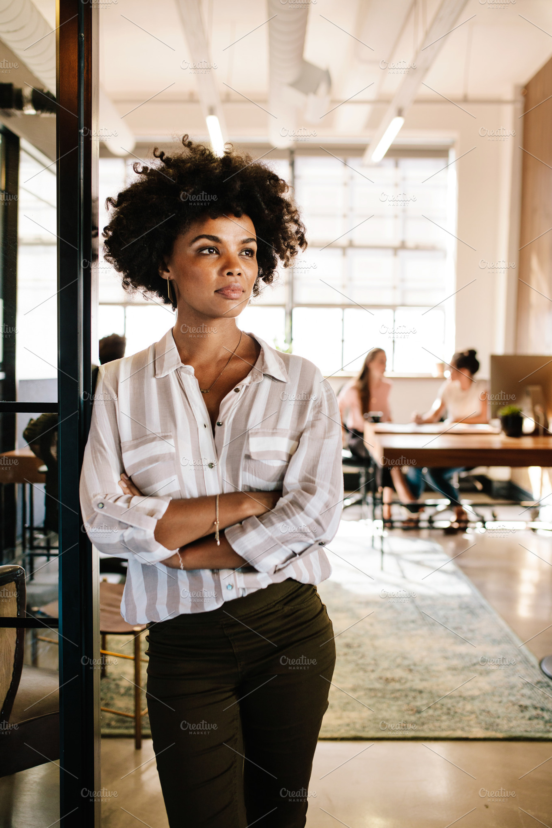 Thoughtful woman at office, a Business Photo by Jacob Lund