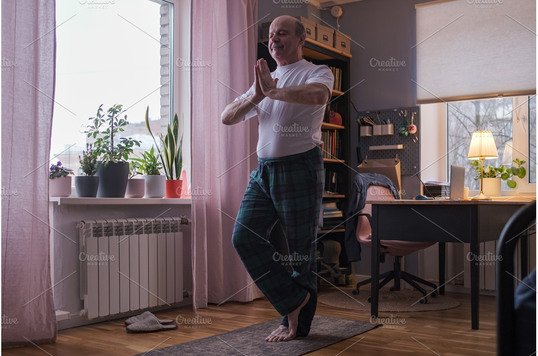 Senior man working out, yoga in, a Sports & Recreation Photo by Koldunov