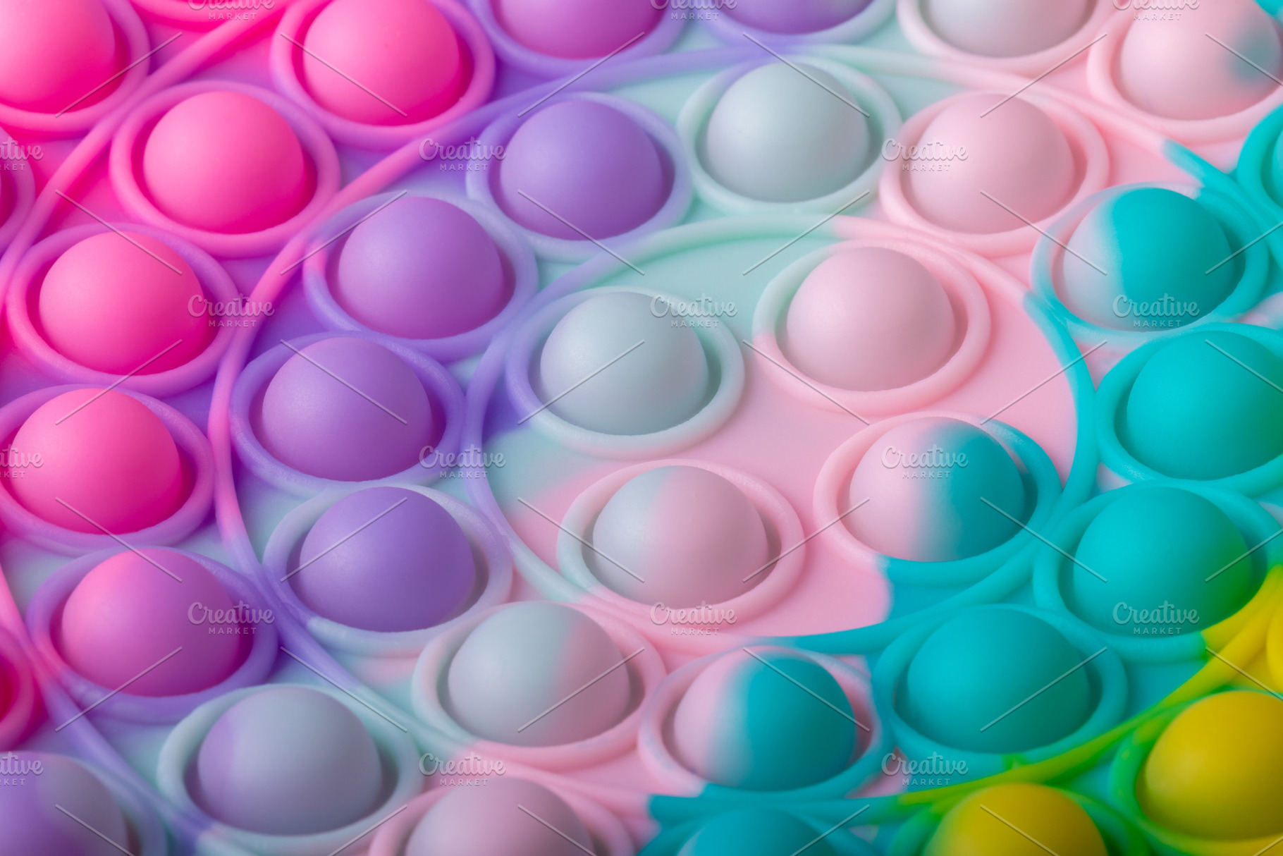 Colorful Pop It Fidget Toy, a Background Photo by Ales Munt