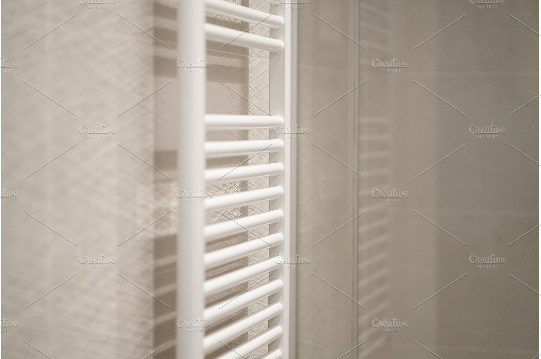 White vertical towel warmer radiator, an Architecture Photo by volodymyrshtun13795