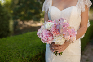 Wedding bouquet containing bouquet, bride, and wedding