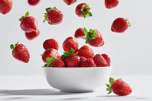 Fresh strawberries in a white bowl, a Photo by Beautiful things