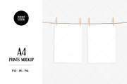 A4 prints mockup with clothespins, a Print Template by Dorado Stock (Thumbnail 1 of 3)
