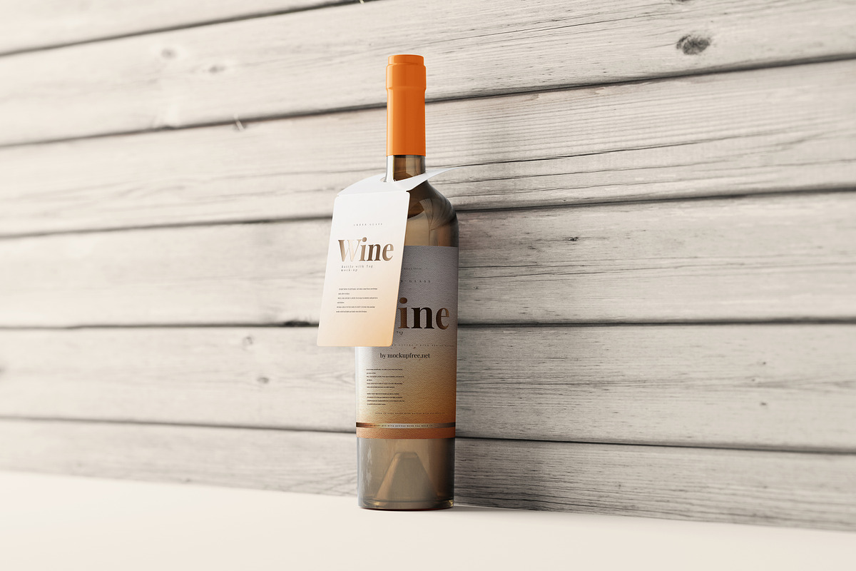 Wine bottle with a tag mockup, a Packaging Mockup by MockupFree.Net (Photo 5 of 5)