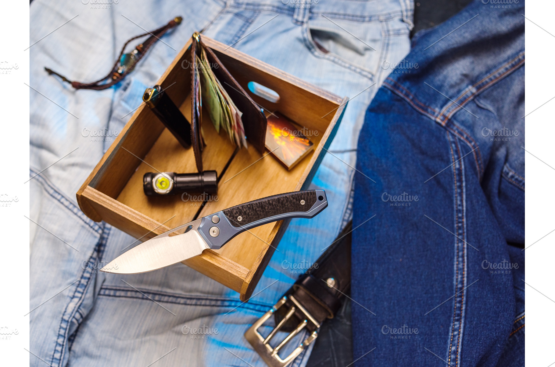 Pocket knife and men's attributes, an Industrial Photo by Stockphoto by vzwer
