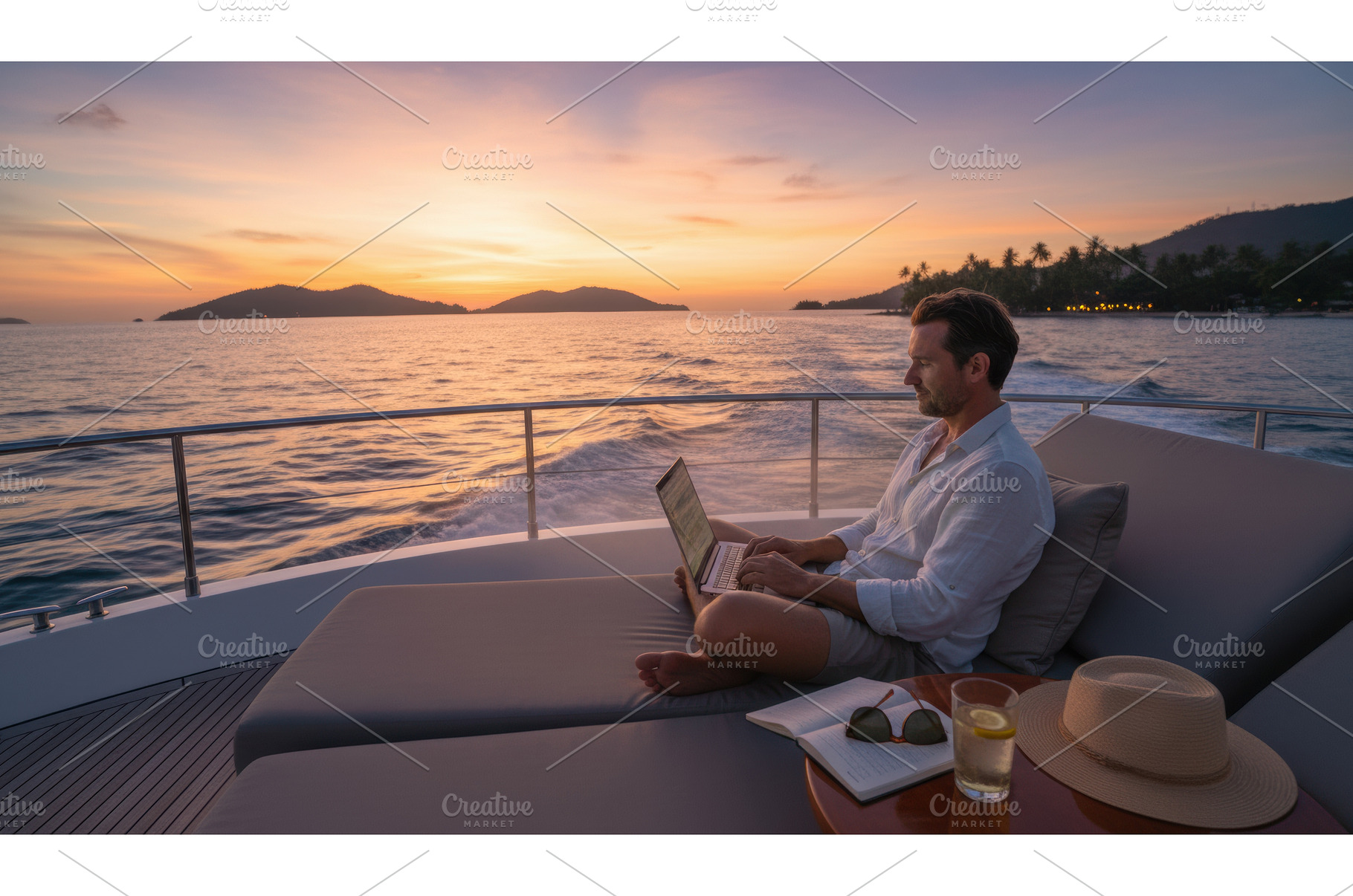 Man working on laptop while relaxing, a Holiday Photo by Igor Tichonow