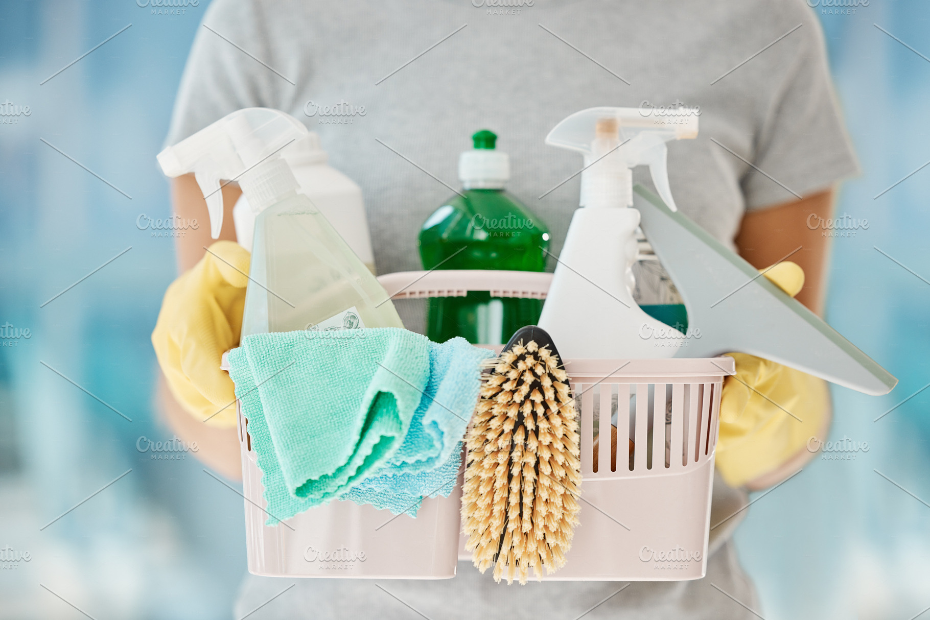 Woman, cleaning container and housekeeping product for home cleaner service, maid or worker. Zoom on spray bottle, brush and fabric cloth for spring clean, tidy interior room and hygiene maintenance, a Photo by Peopleimages.com