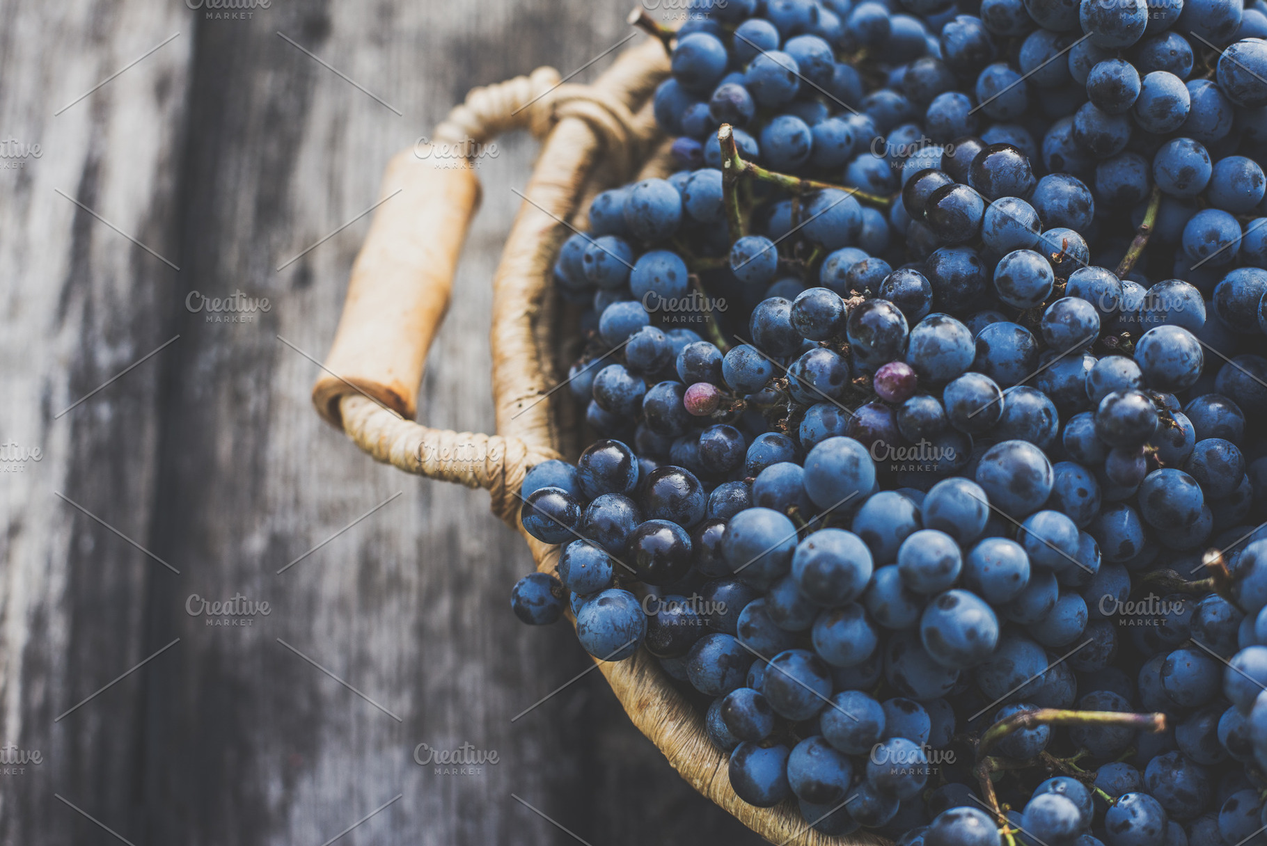 Blue grapes on the basket, a Food & Drink Photo by Mark Borbely