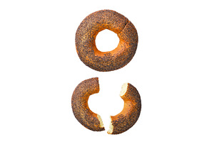 Bagel with poppy seeds and broken in